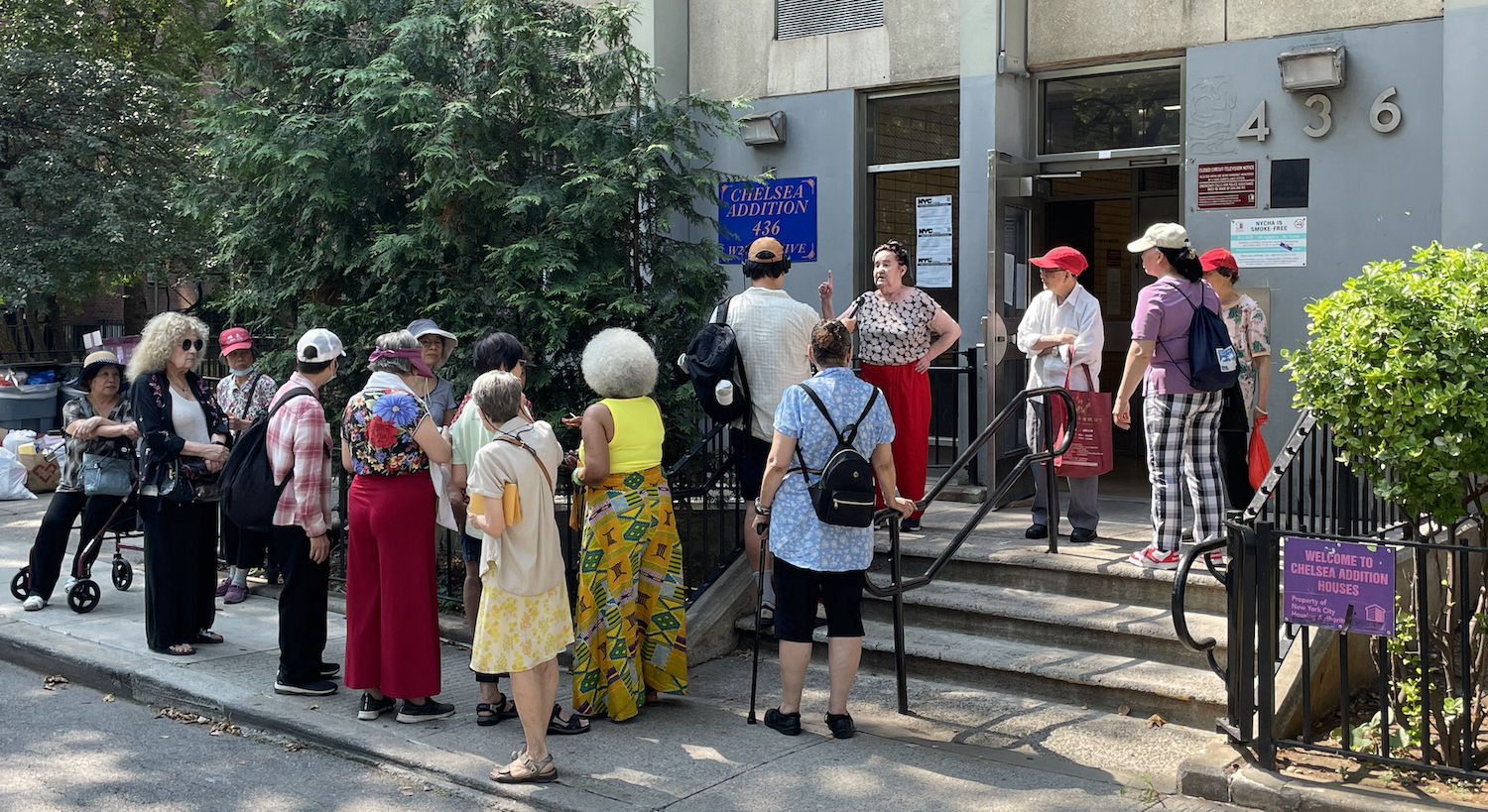 Seniors waited in a line to speak with a reporter about the forced relocation by NYCHA over the looming RAD/PACT demolition of public housing.