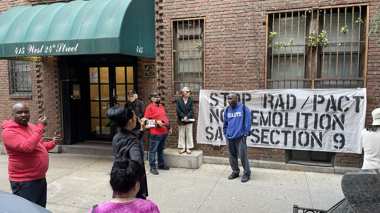 Protest outside Erik Bottcher's apartment building in Chelsea to save NYCHA from privatisation and demolition.